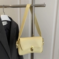 Chic cream yellow underarm bag with gold oval buckle and wide shoulder strap - Yellow