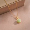 Collana vintage con ciondolo a sacchetto portafortuna in gemma verde e oro titanio - Collana Grande Verde Sacchetto Portafortuna