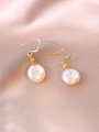 Close-up of pearl drop earrings with gold wire handmade wrap on silk fabric background - Earrings (E1232)
