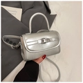 Chic metallic silver crossbody bag with minimalist buckle and sleek top handle - Silver
