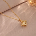 Close-up of golden flower pendant necklace with opal center and zircon details - Gold Rotating Flower Necklace (X3752)
