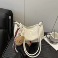 White glossy shoulder bag with thick knot strap and cute bear charm in stylish setting - Standard Type / White