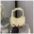 Pale yellow croissant bag with ruched handle and metallic chain strap in glossy finish - Yellow