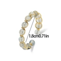 Detalle del anillo artesanal de hilo dorado con piedras labradorita y diámetro de 1,8 cm - Estilo Abierto Envuelto en Alambre Hecho a Mano / Piedra de luna (J0376)
