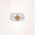 Detailed view of beaded freshwater pearl ring with golden clover and green gemstone - Four Leaf Flower (J0394)