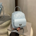 Mini light blue quilted PU leather backpack with silver chain and twist lock detail - Blue