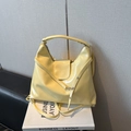 Light yellow glossy patent leather underarm bag with adjustable strap and embossed logo - No Pendant / Yellow