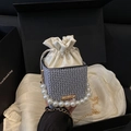 Mini bucket bag with black and white geometric print, pearl handle and gold chain strap - Gray