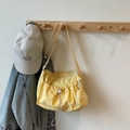Gelbe Nylon-Umhängetasche mit Kordelzugfach und rundem Münztäschchen-Anhänger - Gelb