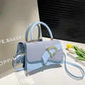 Lichtblauwe crossbodytas van kunstleer en denim met gouden gesp en handvat - Blauw