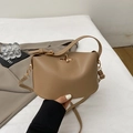Minimalist khaki leather bucket bag with gold metal twist lock and thin top handle - Khaki