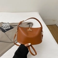 Chic brown leather crossbody handbag with gold hardware and top handle for women - Brown