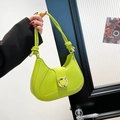 Borsa baguette a mezzaluna verde neon con manico annodato e fibbia in metallo argentato - Verde