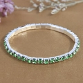 Elegante bracciale tennis argento con cristalli verde smeraldo su tessuto vintage - Verde