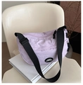 Detail of lavender crescent crossbody bag featuring Lucky Fashion logo and nylon texture - Purple