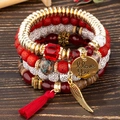 4pcs bohemian beaded bracelet set with wing charms, tassels, and heart-engraved pendants - Red
