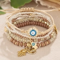 Bohemian multi-layer beaded bracelet set featuring blue Evil Eye and Hamsa hand charms - 6-Piece Set / Coffee