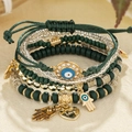 Bohemian multi-layer bracelet set with green beads, evil eye and Hamsa hand charms - 6-Piece Set / Green