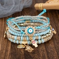Bohemian multi-layer beaded bracelet set with Hamsa hand and blue Evil Eye charms - 6-Piece Set / Light Blue