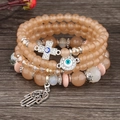 Fünfschichtiges Perlenarmband-Set mit Hamsa-Hand und Evil Eye Kreuz Anhängern in Champagner - Kaffeebraun