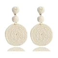 Detail of cream raffia bohemian drop earrings with woven flowers and circular pendants - Woven Flower Style / White