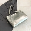 Minimalist silver metallic tote bag with decorative metal bow and slim shoulder straps - Silver