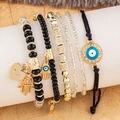 6-piece bohemian multi-layer bracelet set with Hamsa Hand and Evil Eye charms - 6-Piece Set / Black