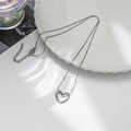 Minimalistische silberne Herz-Halskette mit hohlem Design und eleganter Schlangenkette - Silberton Kleiner Herz-Stil(N2013-ST-S)