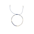 Adjustable Morse code bead bracelet with blue stone and gold metal accents on white background - Dark Blue Gray Gold Patchwork (B2311-GO-F)
