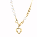 Detail of baroque pearl and gold textured heart pendant on asymmetric chain necklace - Retro Hollow Heart Tag Baroque Pearl Style (N2163-GO)