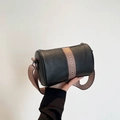 Sac cylindrique en cuir PU noir avec bandoulière tissée aux motifs géométriques - Noir