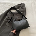 Classic black leather crescent underarm bag with vertical seam and wide shoulder strap - Black