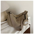Detail of khaki nylon crescent bag with textured fabric and small round coin purse - Khaki