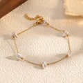 Elegant gold chain bracelet with baroque pearls and adjustable lobster clasp closure - 6 Baroque Pearls Style (STB2549-GO)