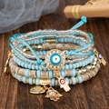 Ensemble de bracelets bohèmes multicouches avec œil porte-bonheur et main hamsa - Bleu