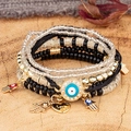 Ensemble de bracelets bohèmes multicouches avec œil protecteur et main de Fatma - Noir