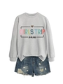 Detailed view of light gray sweatshirt with Girls Trip 2026 text and leopard heart print - S / Grey Top And Blue Shorts