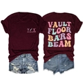 Detail of maroon gymnastics t-shirt showing colorful vault floor bars beam text print - Burgundy