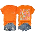 Front and back detail of bright orange gymnastics t-shirt with Vault Floor Bars Beam print - Orange