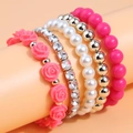 Five-piece stacked beaded bracelet set with pink resin flowers and sparkling crystals - Rose Red