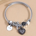 Bracciale a corda d'argento con ciondolo a cuore in strass neri e nota musicale - Nero (63129)