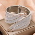Silver angel wing metal cuff bracelet with frosted finish on luxury gift box - Silver