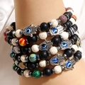 Set de pulseras bohemias multicapa con mano de Fátima y amuletos de ojo turco azul - Estilo Ojo Turco / Mano de Fátima (4072604)