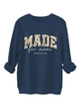 Detail of navy blue sweatshirt showing ribbed cuffs and floral Made For More print - S / Navy Blue