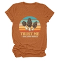Detail of burnt orange t-shirt featuring mushroom sunset print and witty slogan - S / Burnt Orange