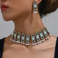 Vintage gold jewelry set with blue opal stones and white pearl tassels on a model - AB Color Set (50703)
