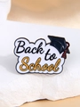 Close-up of enamel Back to School brooch with a black graduation cap on white stone - Back to School Cloud Style (Alphabet Pattern 1)