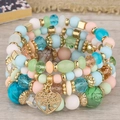 Bracelet multicouche style bohème avec pendentif cœur arbre de vie aux tons pastels - Multicolore Clair