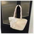 Detail of woven tote bag with pearl button closure and white lace bow accessory - Large Off-white With Charm