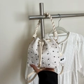 Bolso saco blanco con textura plisada y bordado de lazos negros para un estilo dulce - Blanco
